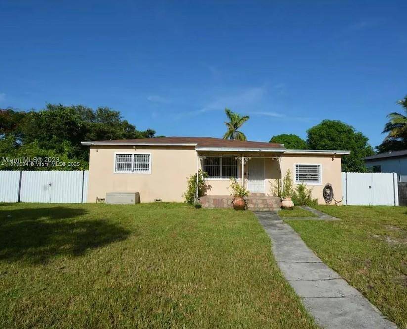 A BRIGHT AND SPACIOUS SINGLE FAMILY HOME IN BISCAYNE GARDENS, OFFERING A RELAXED FLORIDA LIFESTYLE WITH AMAZING ACCESS.