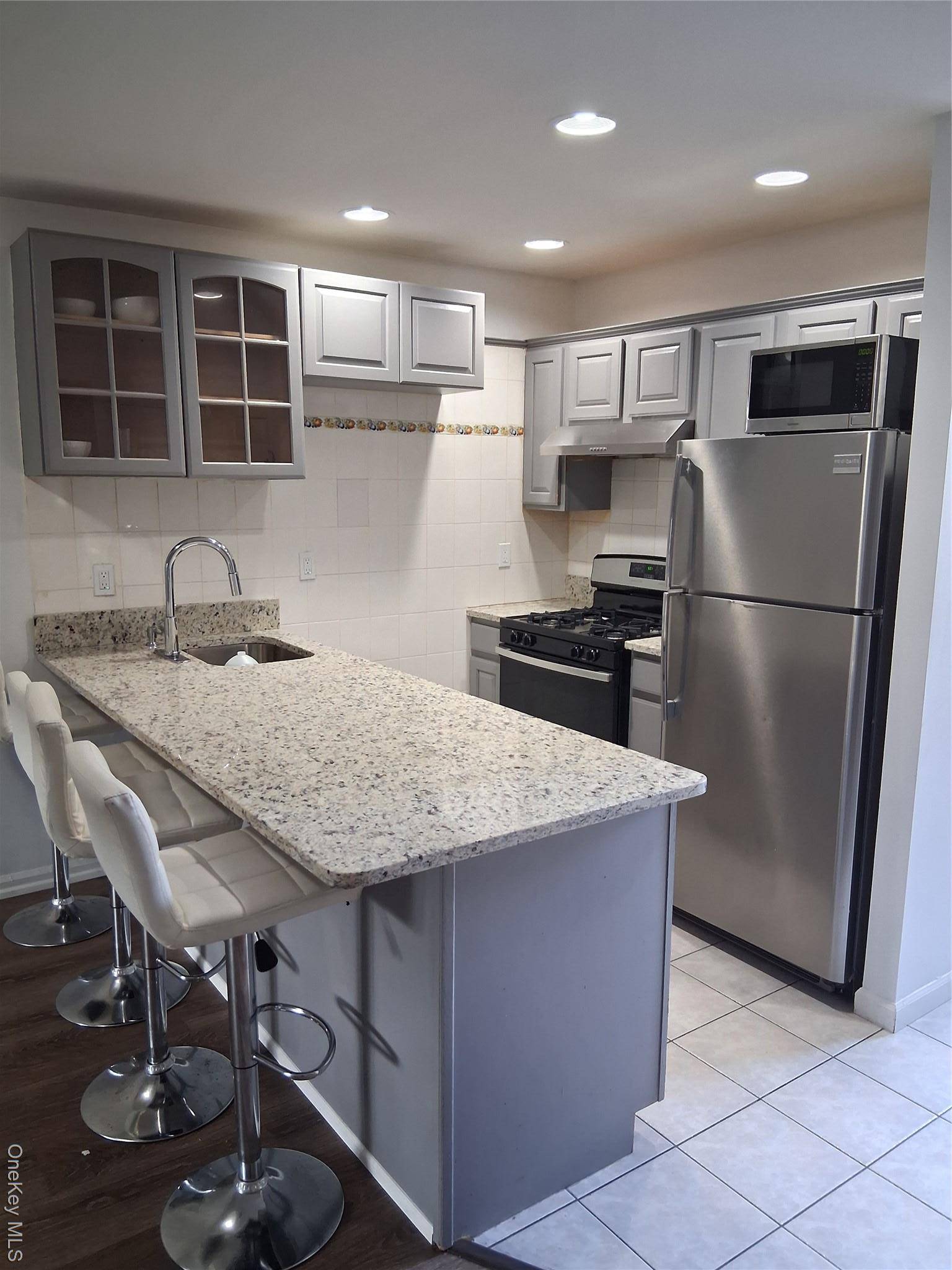 Fully renovated 2 bedroom one bath condo, in Throggs Neck walk in level condominium with assigned parking, safe secure building with private entrance, close to all.