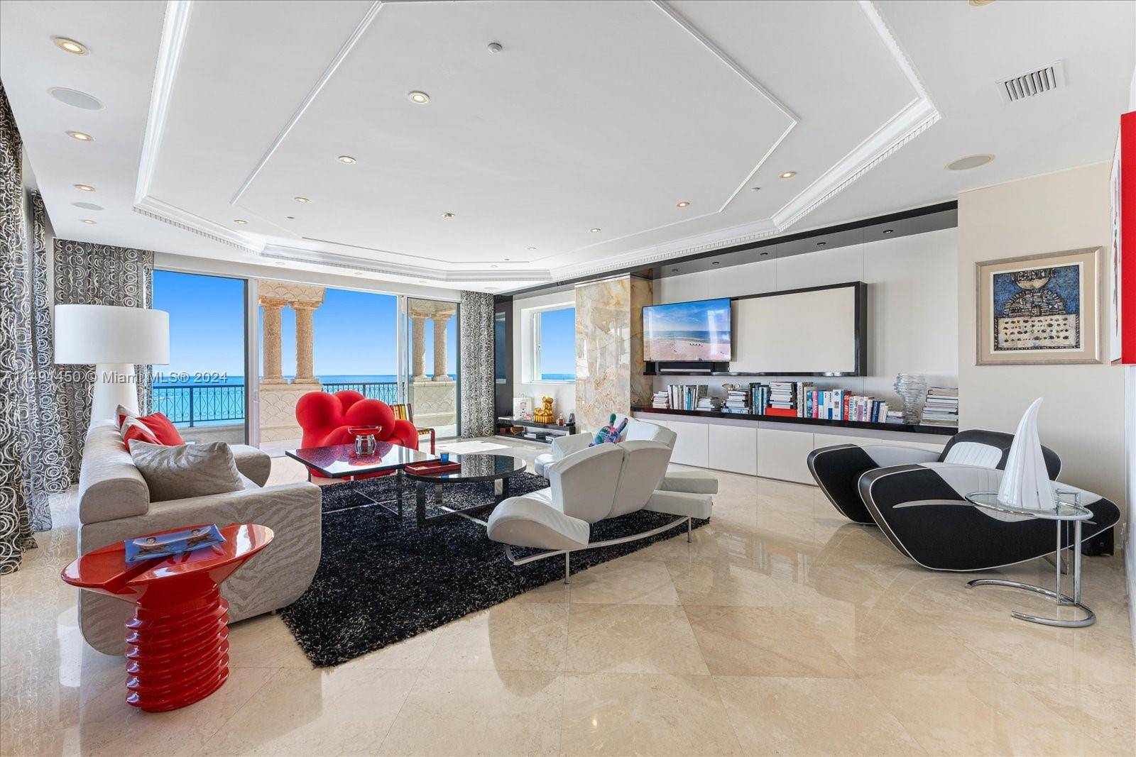 Explore this unparalleled Oceanside Tower Suite on Fisher Island offering 5 bedrooms, 6.