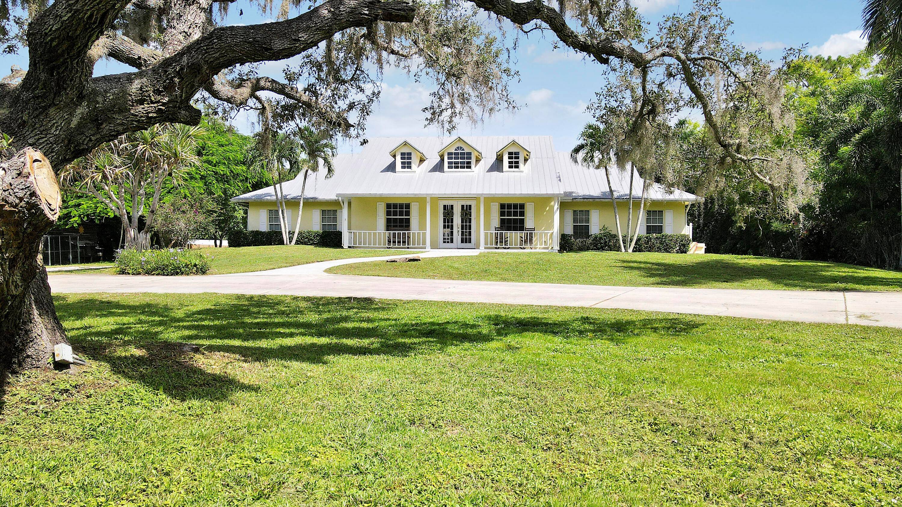 Rare to market 4 bedroom CBS home on nearly 2 acres of fully fenced property in the heart of Stuart !