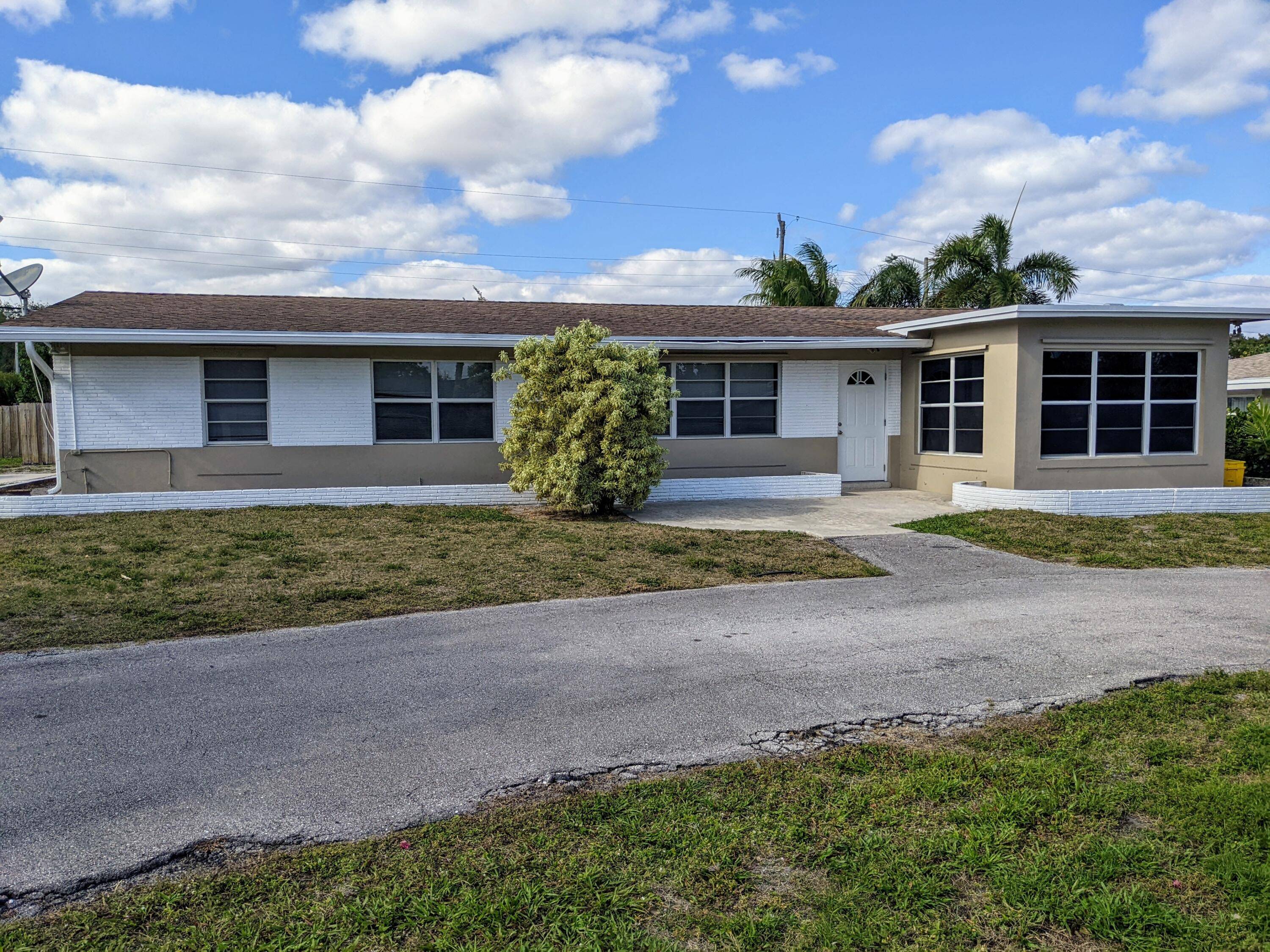 Florida style pool home with updated kitchen and bathrooms.