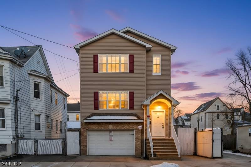 Well maintained two family residence offering generous living space throughout.