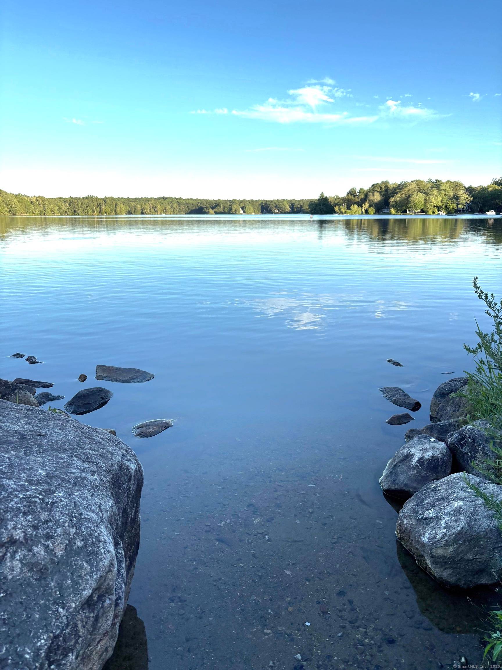 Welcome to 145 Lakeside Drive, a beautifully renovated home in the heart of Lebanon, CT.