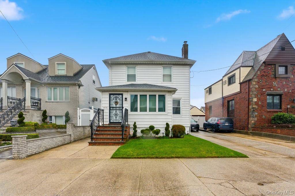 Welcome to this beautifully maintained Colonial home located in the neighborhood of Old Howard Beach.