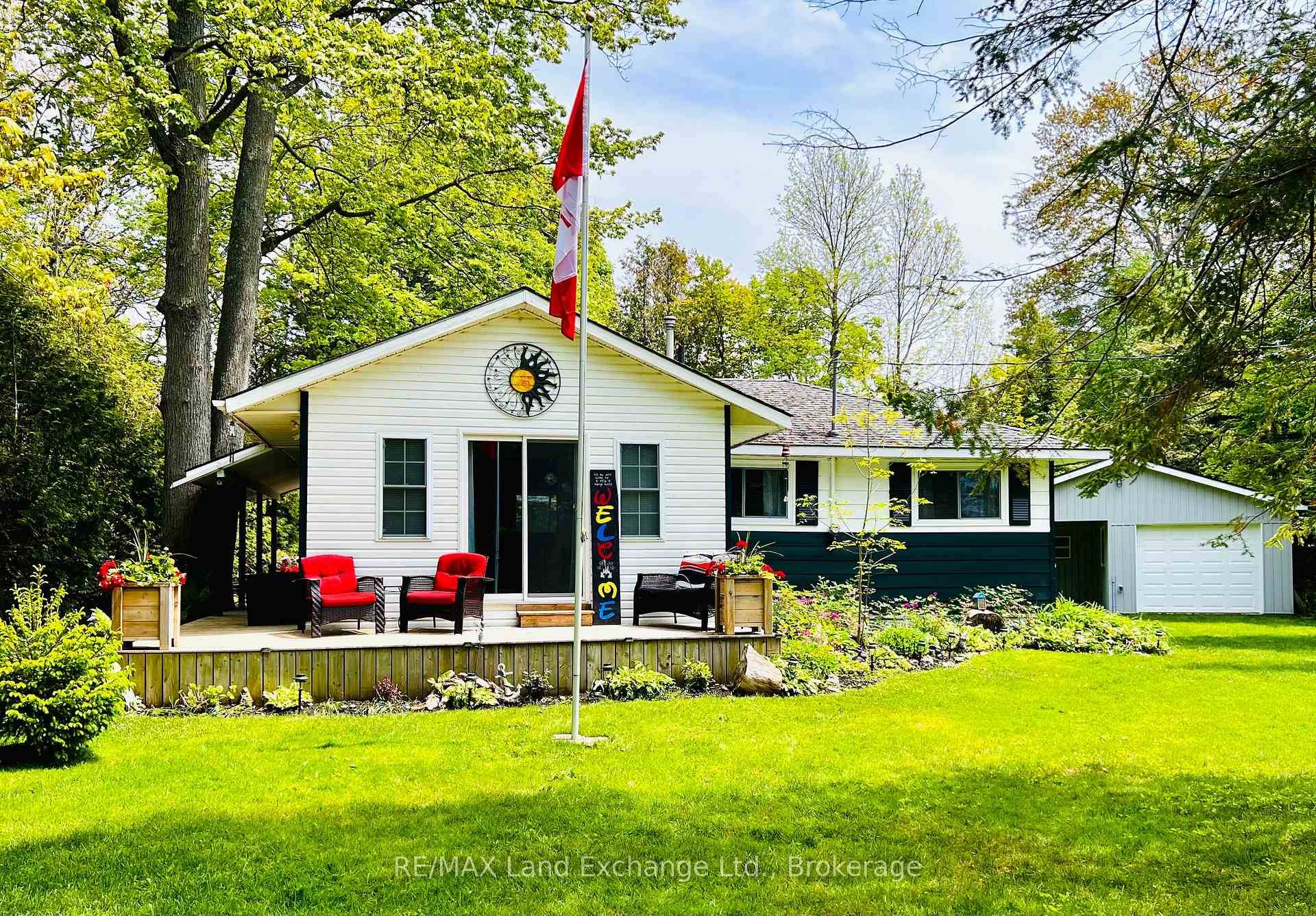 NEW PRICE ! Escape to this warm and inviting family cottage nestled in the heart of scenic Point Clark, just a short stroll from sandy beach access.