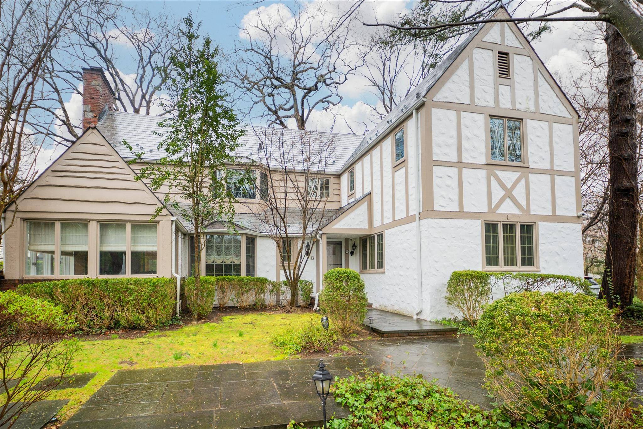 Exquisite Tudor Masterpiece in Prestigious University Gardens.