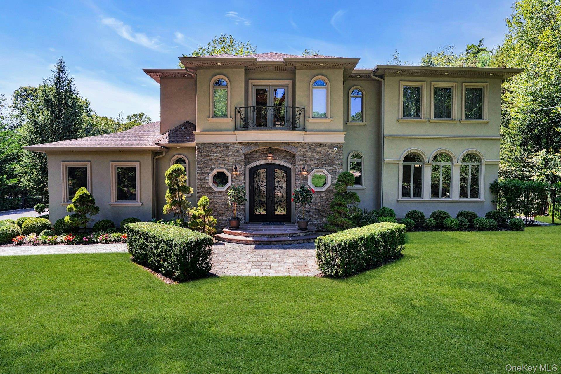 Magnificent, well appointed, one of kind grand colonial with a two story entrance and a bridle staircase.