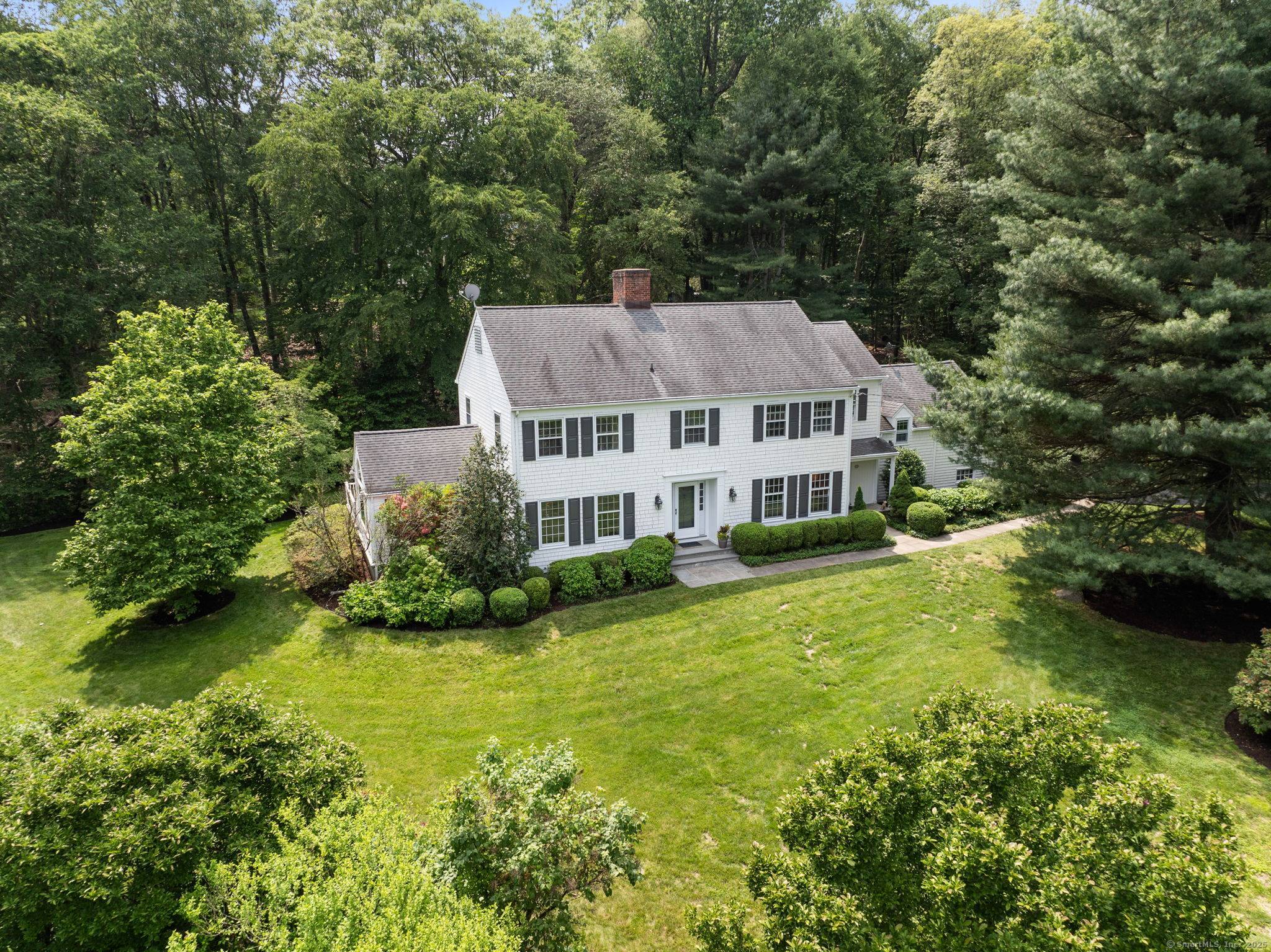 Sited on a magnificent property, down a long private driveway, a Quintessential Cornell Colonial awaits the next lucky owners.