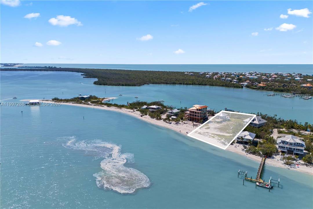 HEAVEN ON EARTH ! Rare opportunity to own an almost full acre of beachfront property with bay to gulf access on North Captiva Island with access via boat, ferry, airplane ...