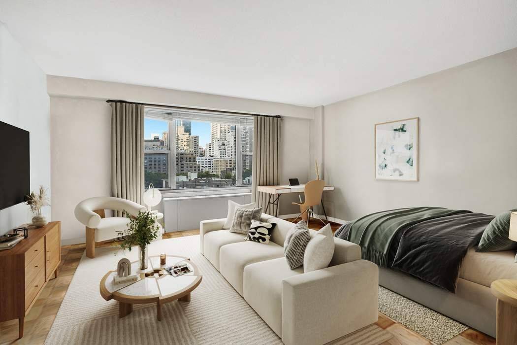 Perched on the 11th floor, this extra large alcove studio offers a rare combination of light, views, and intelligent design.