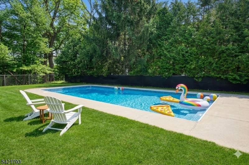 Welcome to 8 Village Green Ct, a hidden gem set on a private cul de sac within 4.