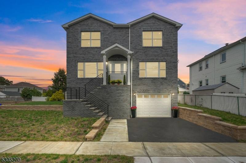 A stunning new construction home, thoughtfully designed and built from the ground up, perfectly situated on a quiet cul de sac in desirable Bergen County !