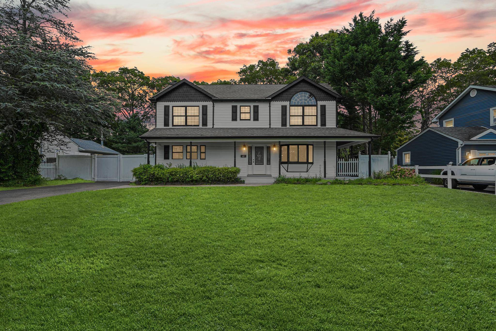Welcome to this beautifully renovated 5 bedroom Colonial located in the highly desirable neighborhood of East Islip.
