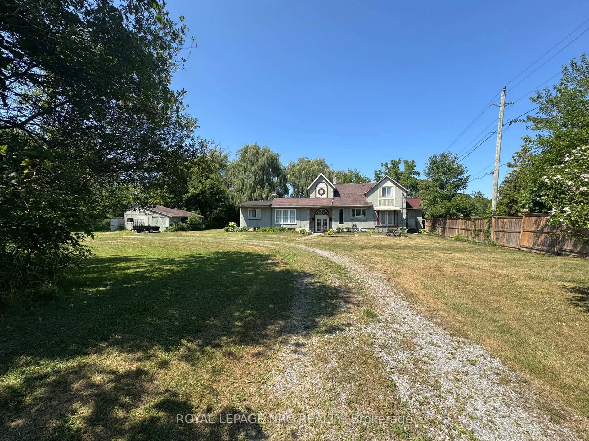 Unique opportunity to enjoy country living just minutes from city amenities in this versatile 5 bedroom character home on 2 acres.