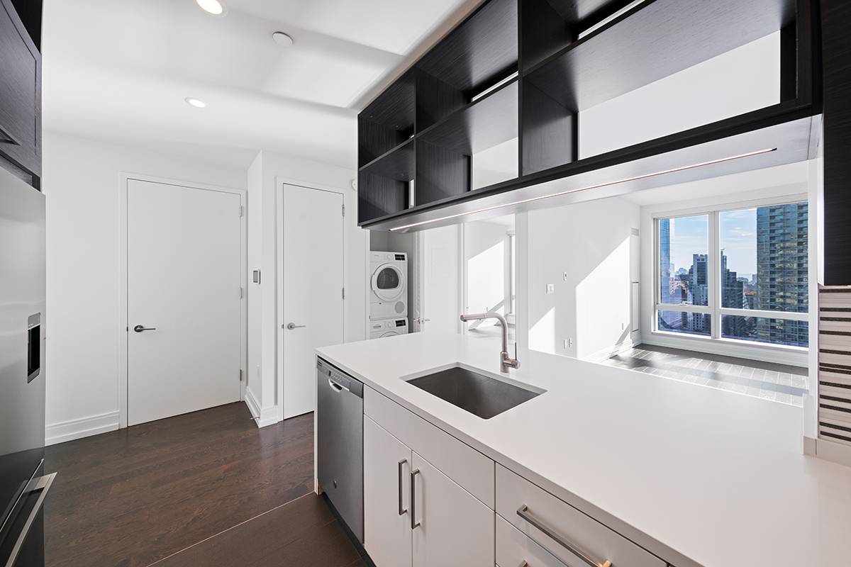 With sweeping views of the city from sunrise to sunset 555TEN towers over the new West Side.