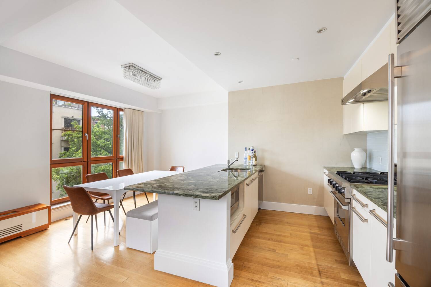 Renovated Two Bedroom Condo with In Building Parking Space Included !