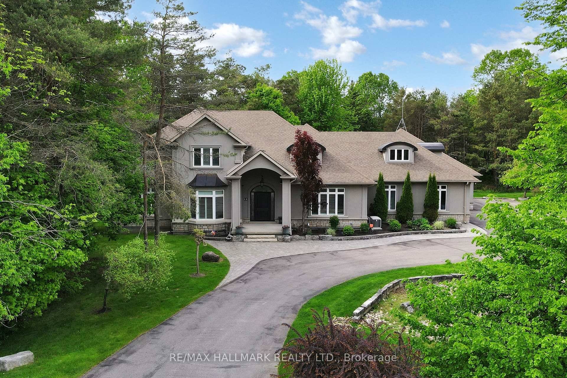 Opportunity Knocks ! This Beautiful Custom Home Is Nestled On A Private 1.
