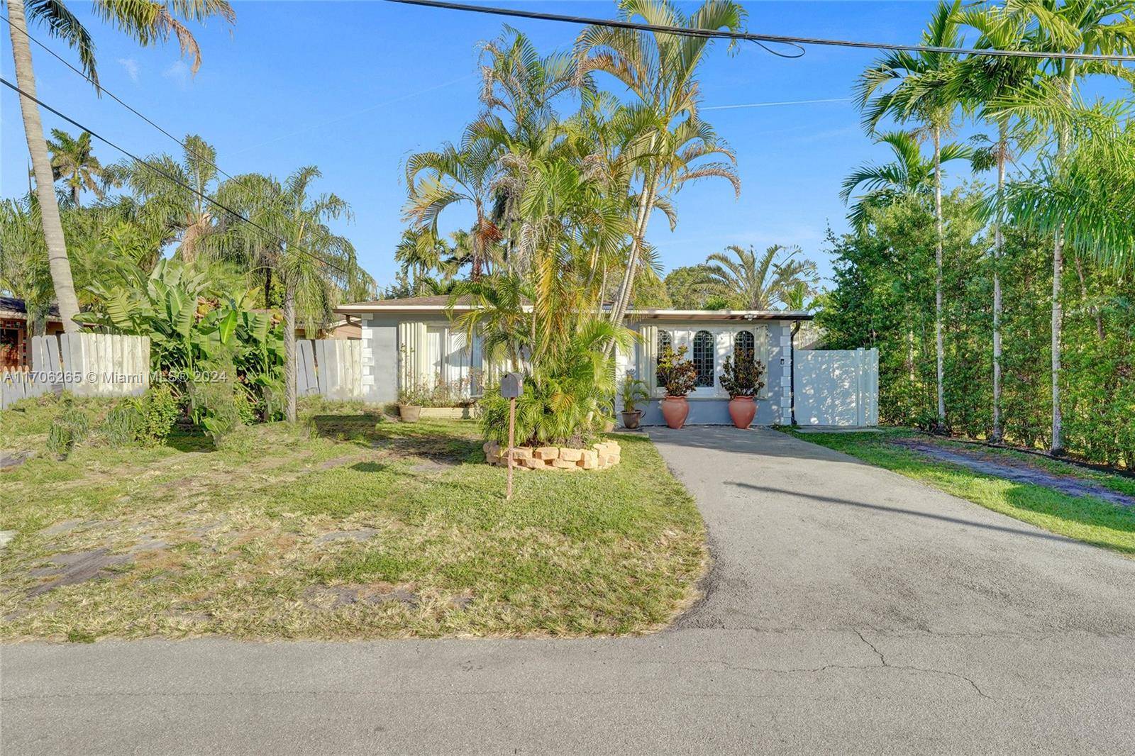 This beautifully remodeled 4 bedroom 3 bath home combines modern elegance with functional design.