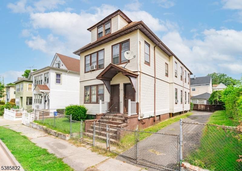 This two family home in Paterson, NJ offers great potential with a bonus unit.