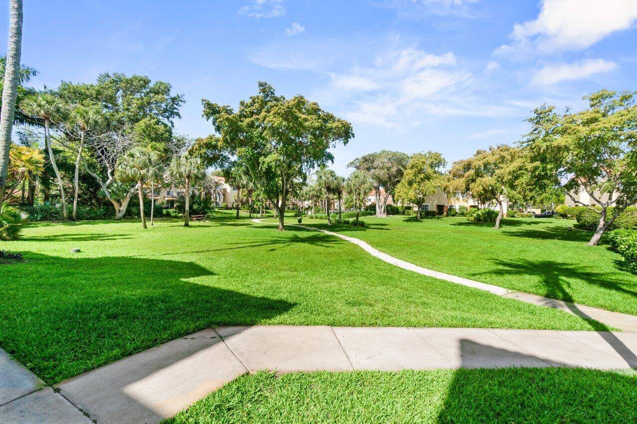 Welcome to 127 Yacht Club Way 208, a charming residence nestled within a prestigious gated waterfront community.
