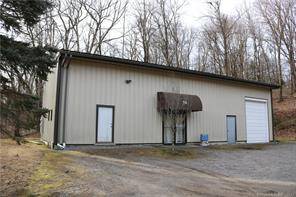 One of a kind non conforming industrial building with great exposure on state highway Route 254 close to Litchfield Center.