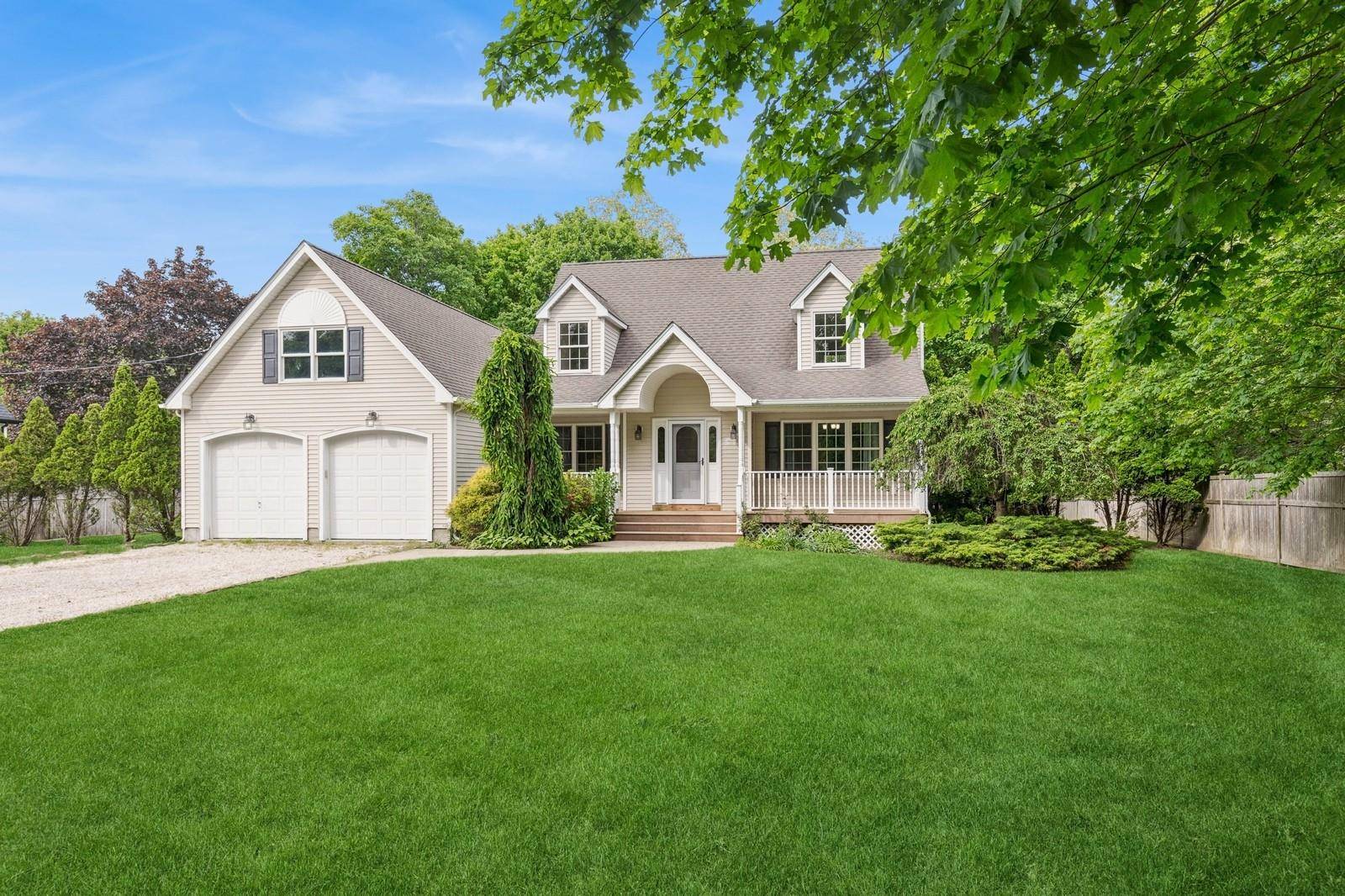 Classic Cape with Open Front Porch on Quiet Side Street.