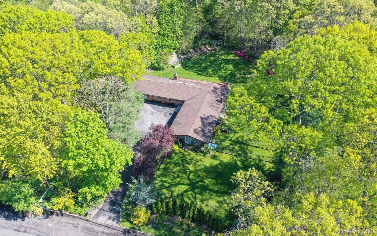 Modern Living in Syosset s Best Location !