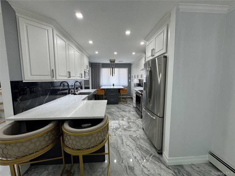 Beautiful updated 2 bedroom, 2 and half bath condo at the desirable townhouse community The Quay in Tarrytown.