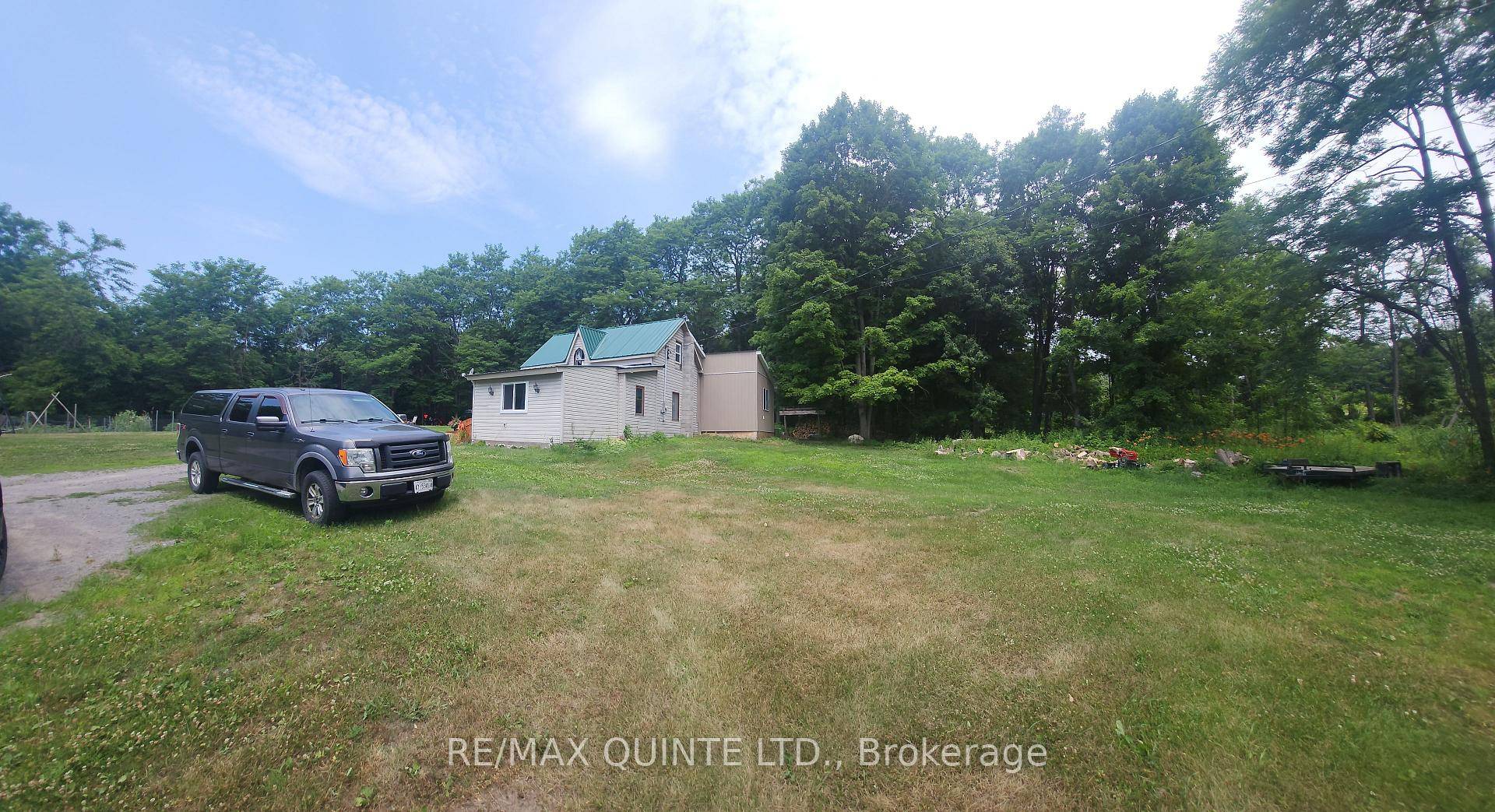 Terrific Four acres with private access through crown land to the Moira River which is very scenic and offers great fishing and swimming.
