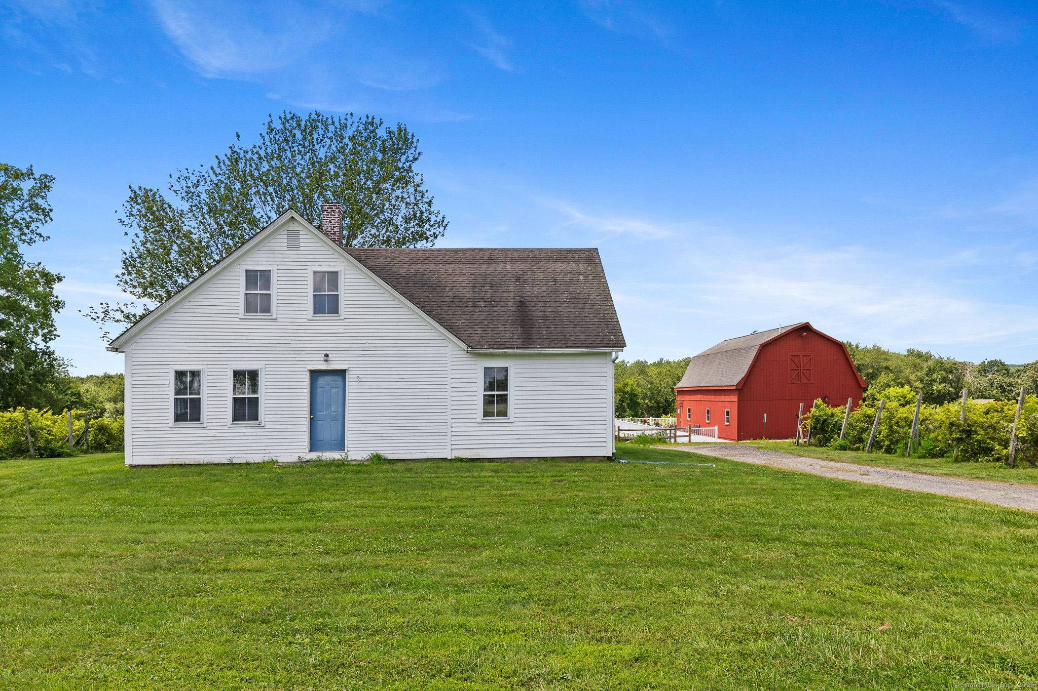 Step into the heart of New England's storied past with this exceptional property located directly across from the picturesque Lebanon Town Green.