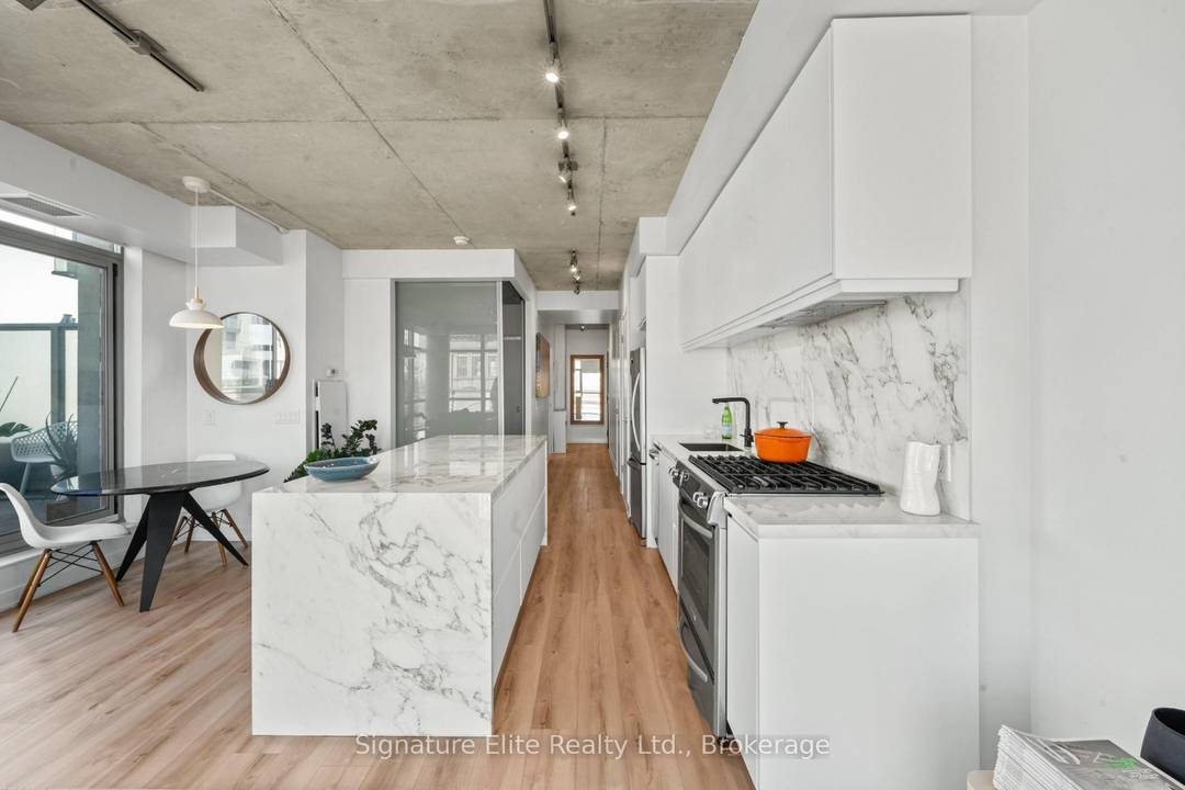 Step into the ultimate urban dream a rare corner loft perched high in a boutique 8 story building by Streetcar Developments.