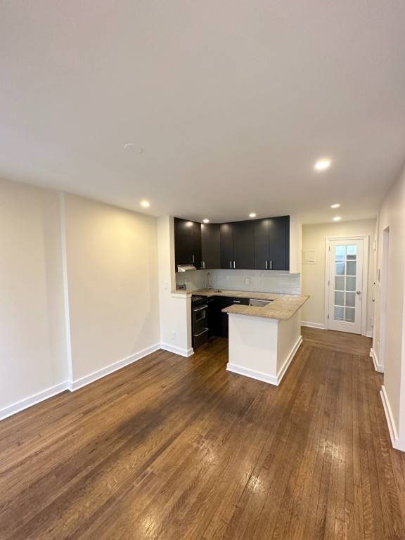 Welcome to this well appointed One Bedroom in a quintessential NYC Townhouse on 57th Street !