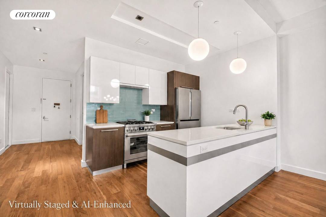 Loft like scale, south facing light, and refined flexibility define Residence 207, an expansive 1, 232 square foot home with two full baths at The Powerhouse.