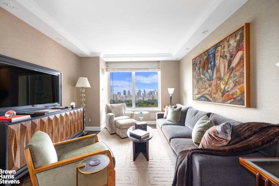 PARK VIEWS FROM EVERY ROOM Experience refined luxury living in this exceptional two bedroom 2 1 2bath residence spanning 1928 sq ft with every room framing uninterrupted views of Central ...