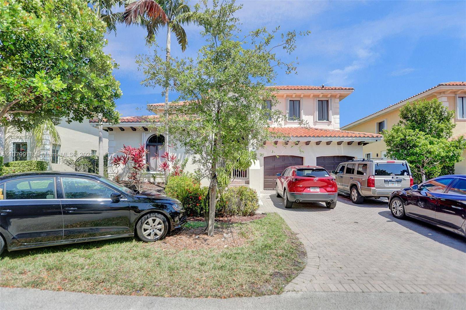 Featuring 5 beds, 4 and a half baths, and a 1 1 guest suite, this two story home in Cutler Cay has tons of potential.