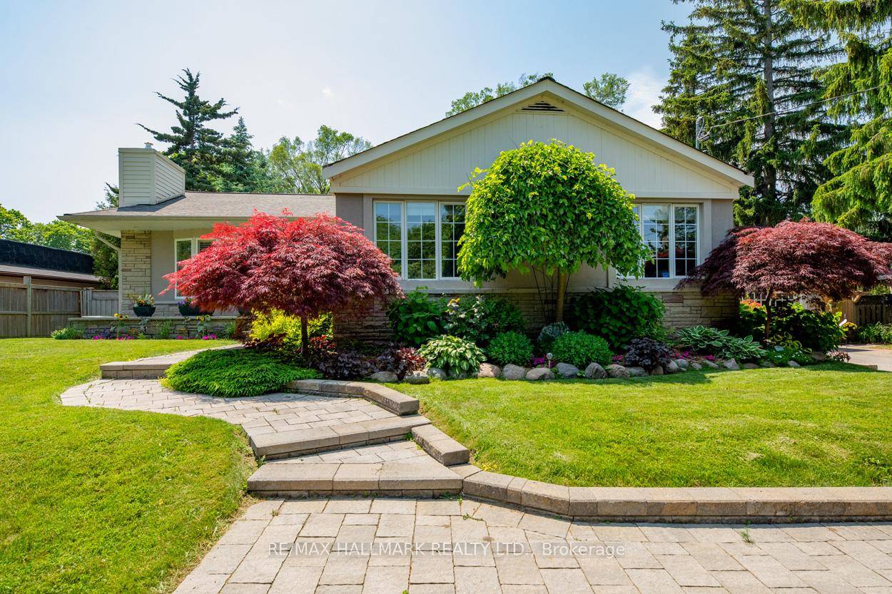 This exceptional ranch style bungalow features a generously proportioned lot measuring 100 by 156 feet.