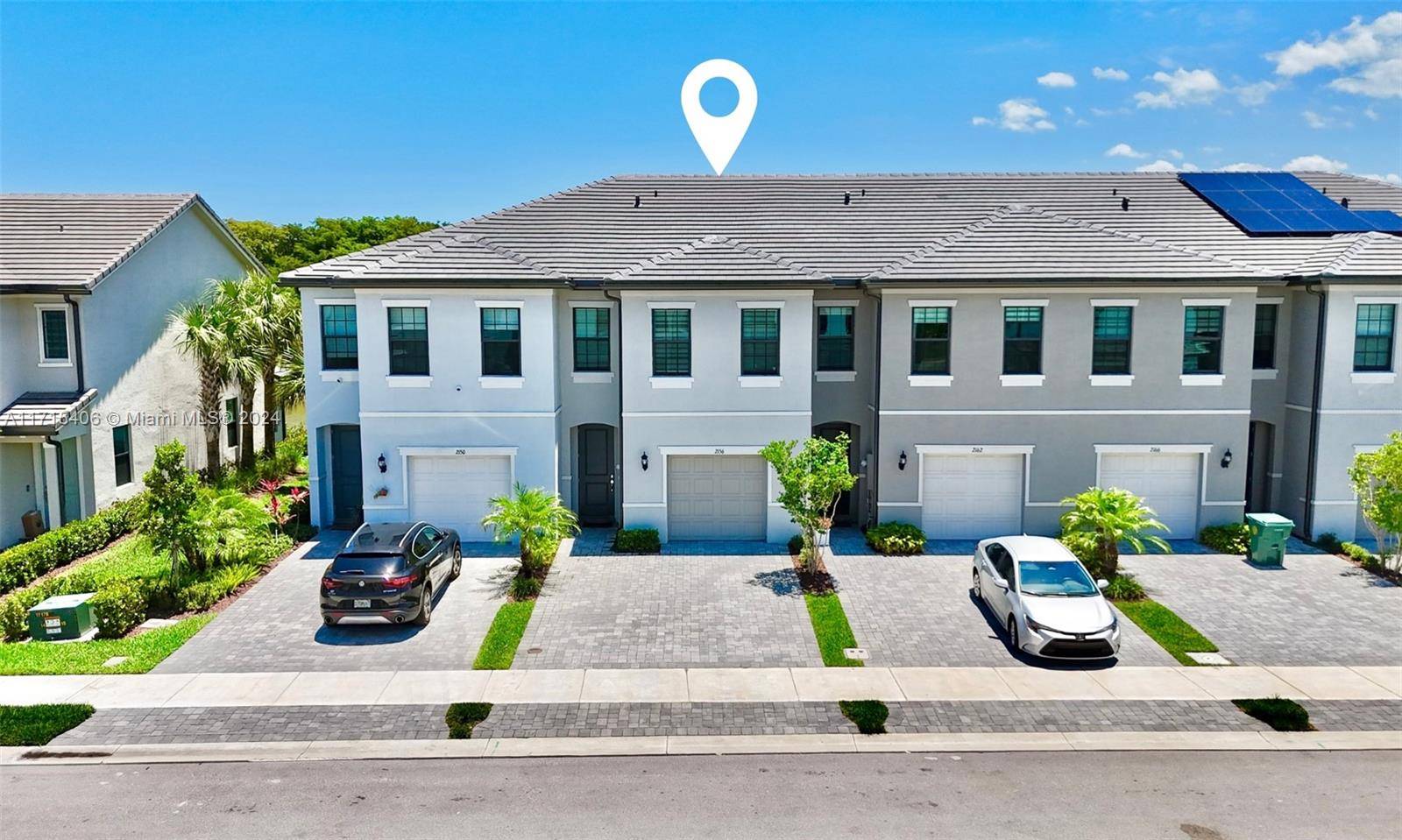 Discover resort style living in this NEWLY BUILT 2023 lakefront townhouse at Oak Tree by Pulte Homes Oakland Park, FL.