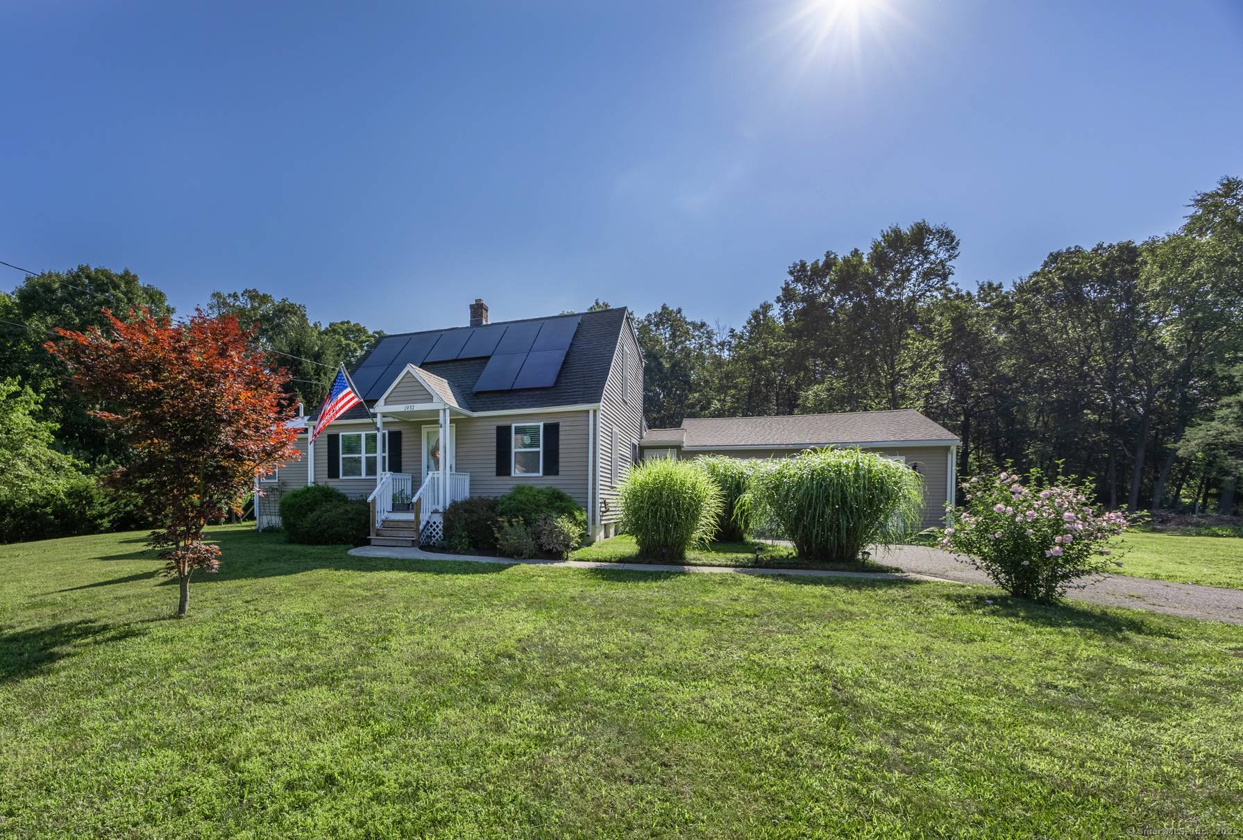 Welcome to this beautifully updated 4 bedroom Cape Cod style home, set on 2.