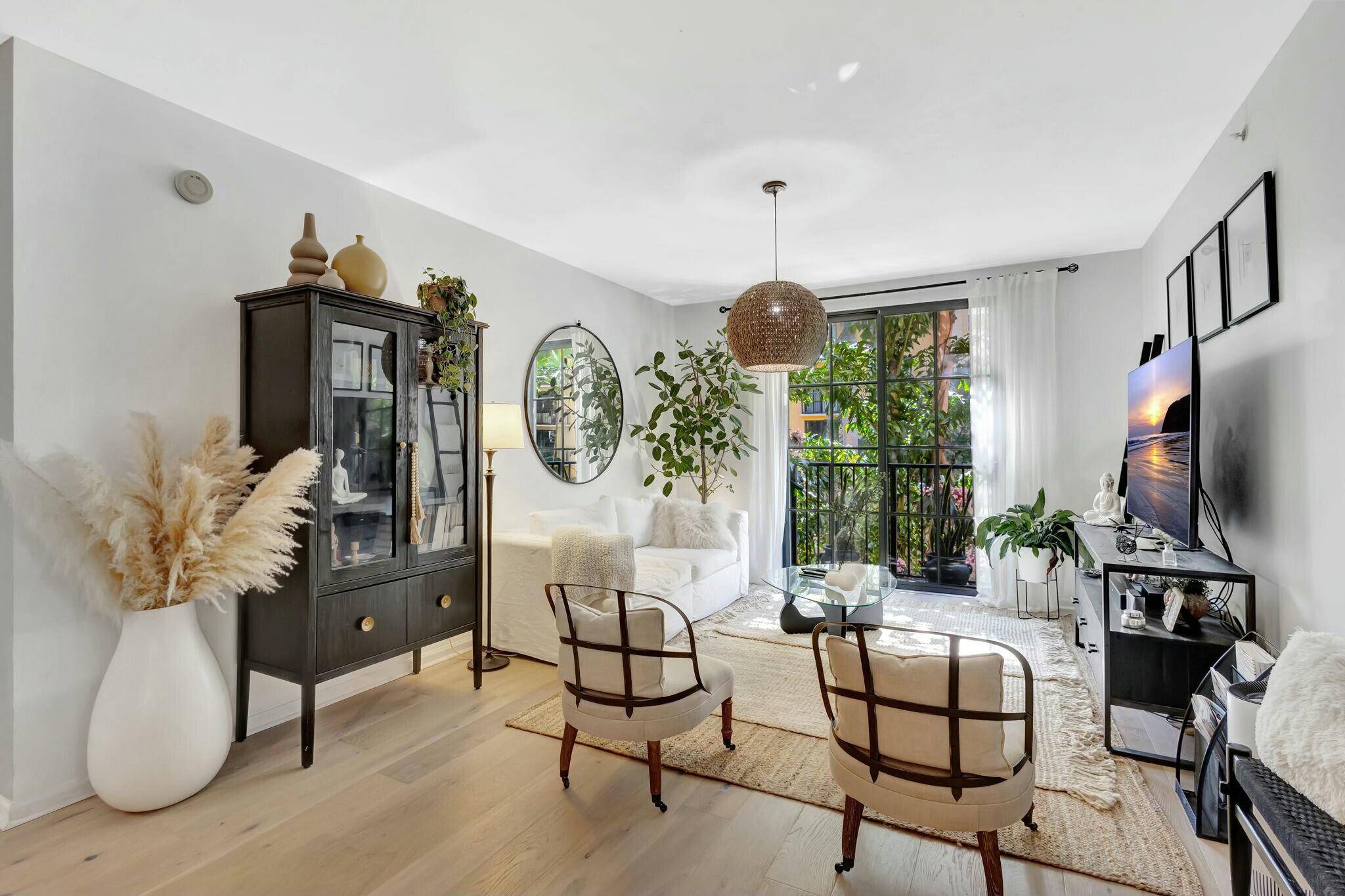 Welcome home to this updated modern 2nd floor corner unit in The Courtyards at CityPlace.