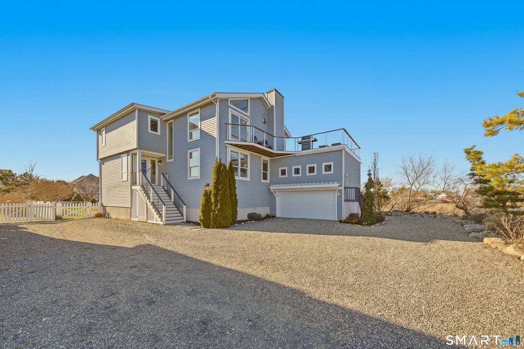 Discover your coastal sanctuary with beautiful Long Island Sound water views, at 9 Marsh Road on Saugatuck Shores a hidden gem off the Westport coastline.