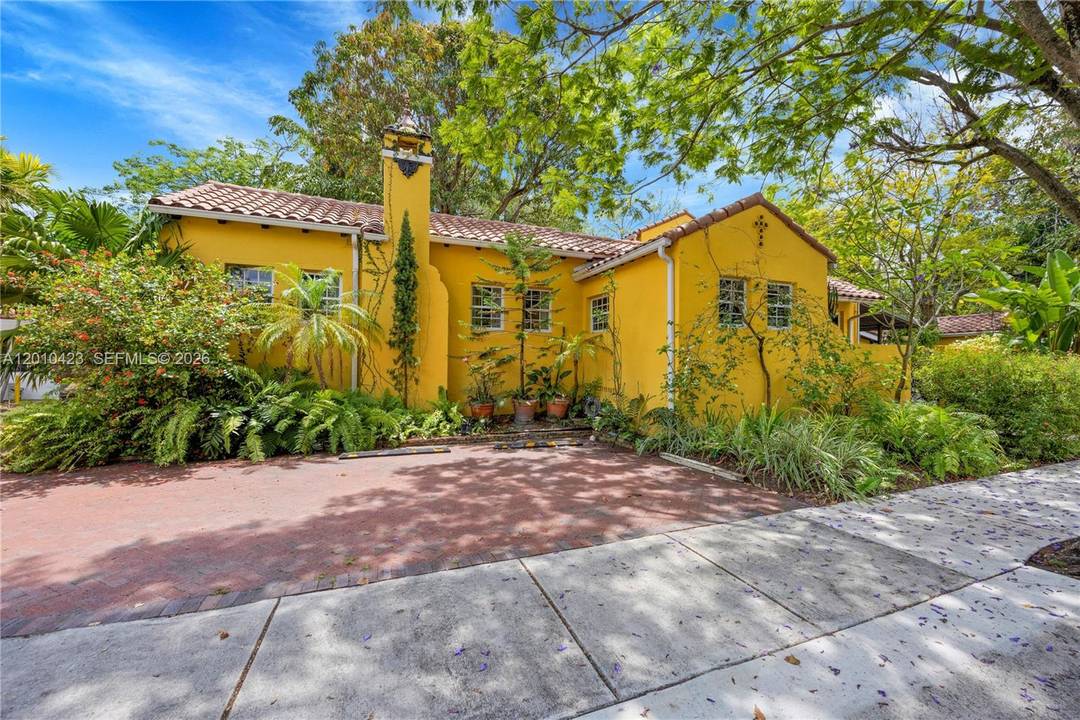 Old Hollywood elegance meets tropical Miami living in Belle Meade !