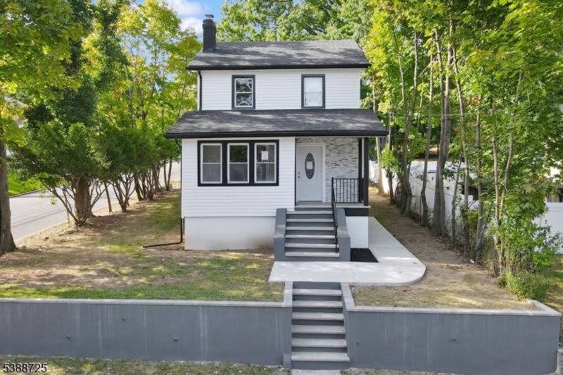 Fully Renovated Colonial on a Corner Lot !