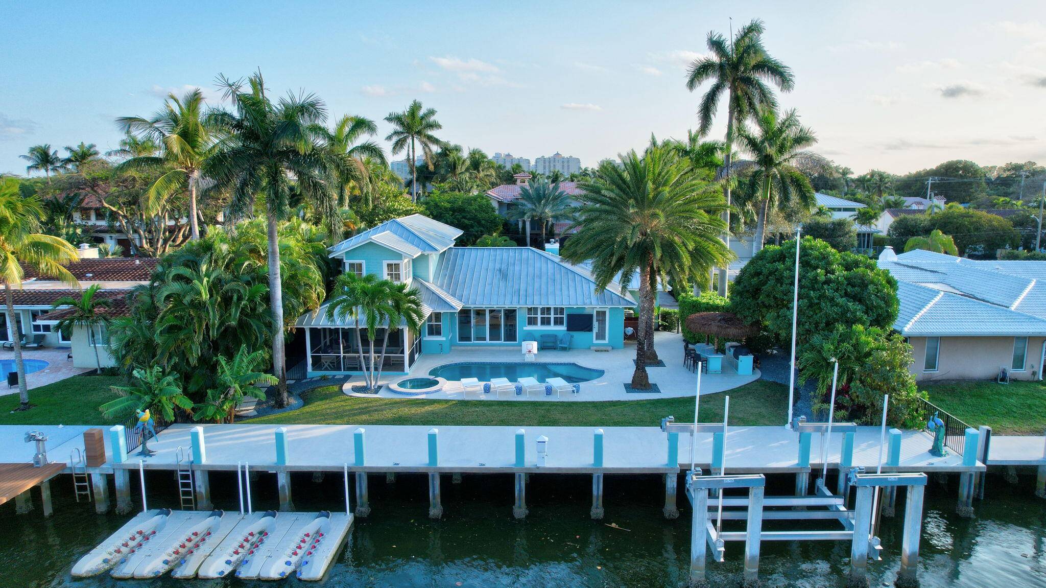 Located in one of the most coveted waterfront communities, this nearly new custom home is a true entertainer's haven.