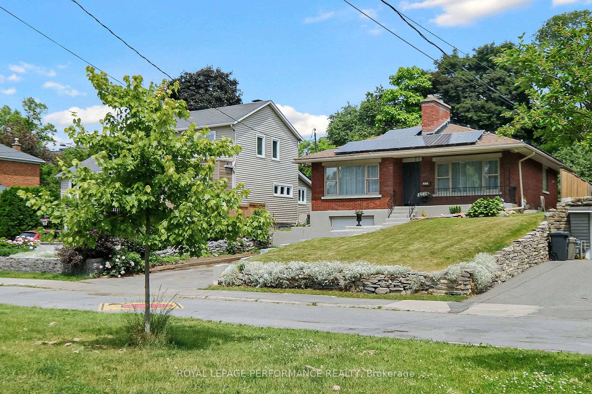 Lovely 4 3 1 bedroom bungalow on huge lot in a most coveted location.