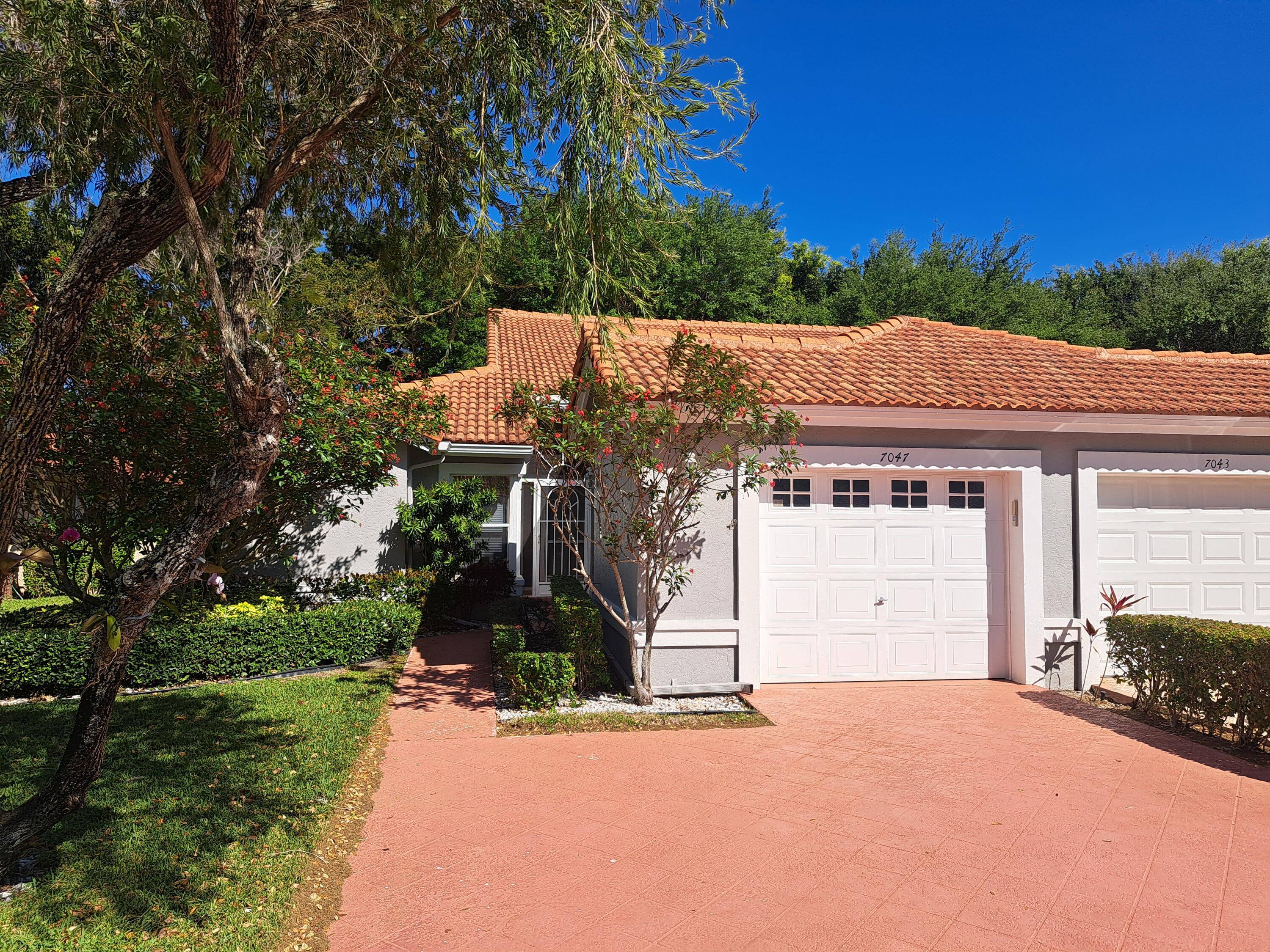 BELOW MARKET PRICED FOR QUICK SALE, this beautifully maintained 3 bedroom, 2 bathroom villa is ideally located in the heart of Palm Isles, just steps away from its exceptional amenities.