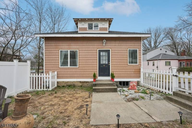 Welcome home to this charming and well maintained 2 bedroom, 1 bath bungalow, ideally set back from the road on a level lot.