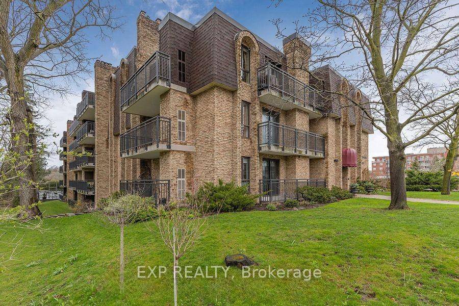 This bright and spacious ground floor corner suite offers almost 1, 200 square feet of living space in a quaint and quiet building in the heart of Aurora.