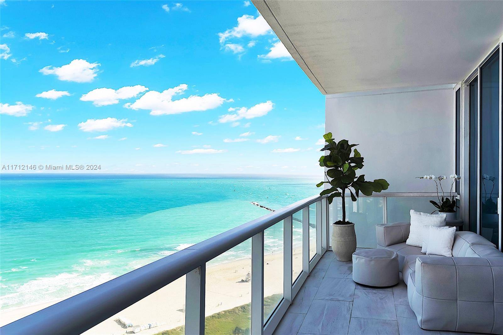 A stunning turn key, direct ocean front apt with the WOW !