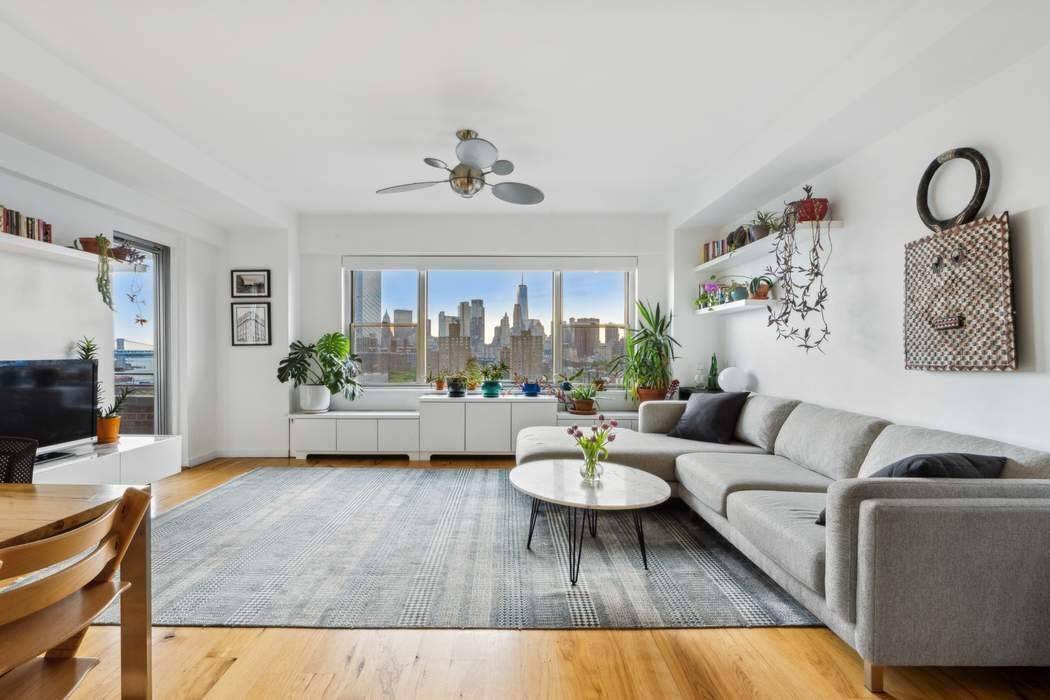 Perched high up on the 17th floor, with magnificent unobstructed views of iconic lower Manhattan, the East River, and Brooklyn, residence D1706 has it all.