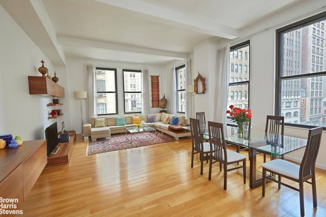 NoMad Loft with Private Elevator Access At the crossroads of NoMad and Flatiron, just one block from Madison Square Park, this exceptional two bedroom residence with a large home office ...